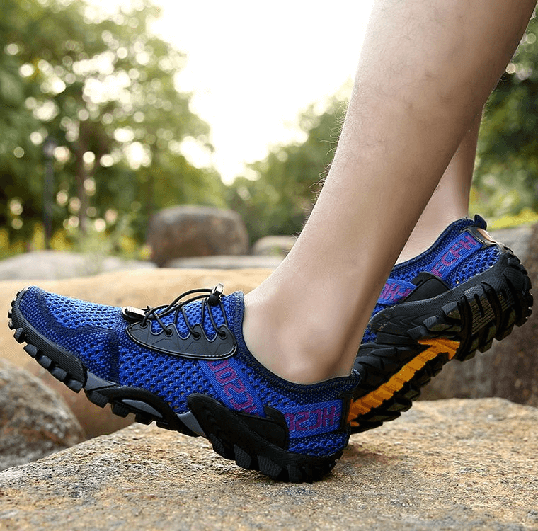 Men's breathable elastic camping shoes with durable rubber outsole, featuring blue mesh upper, perfect for outdoor activities.